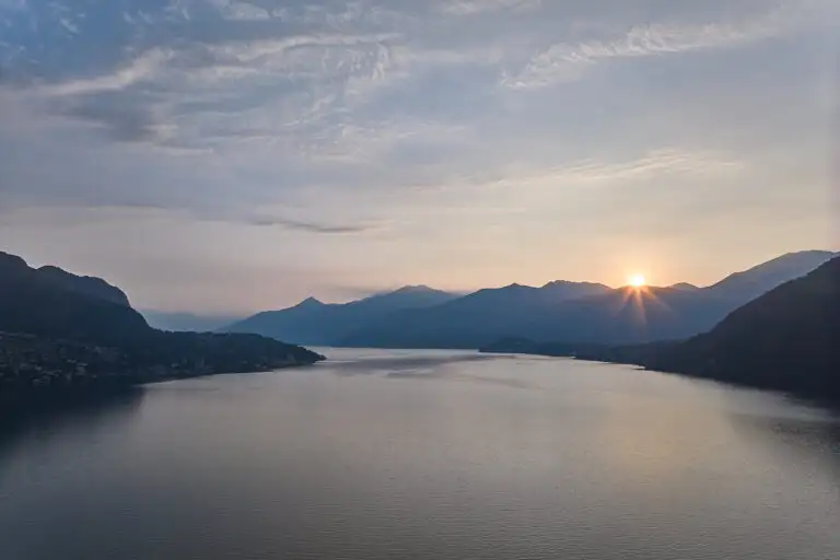 an aerial view of sunrise on lake Como